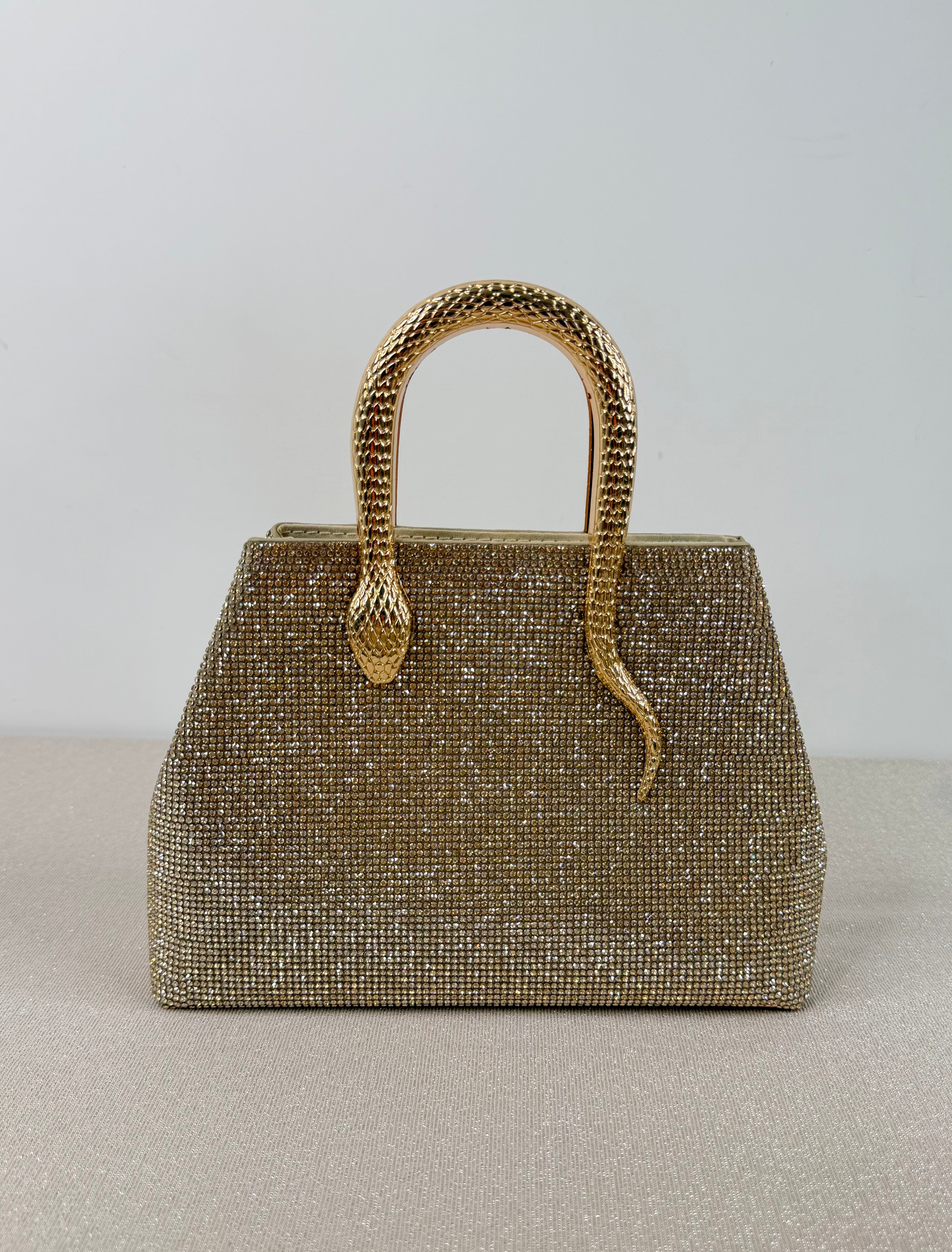 Borsa con manico a serpente