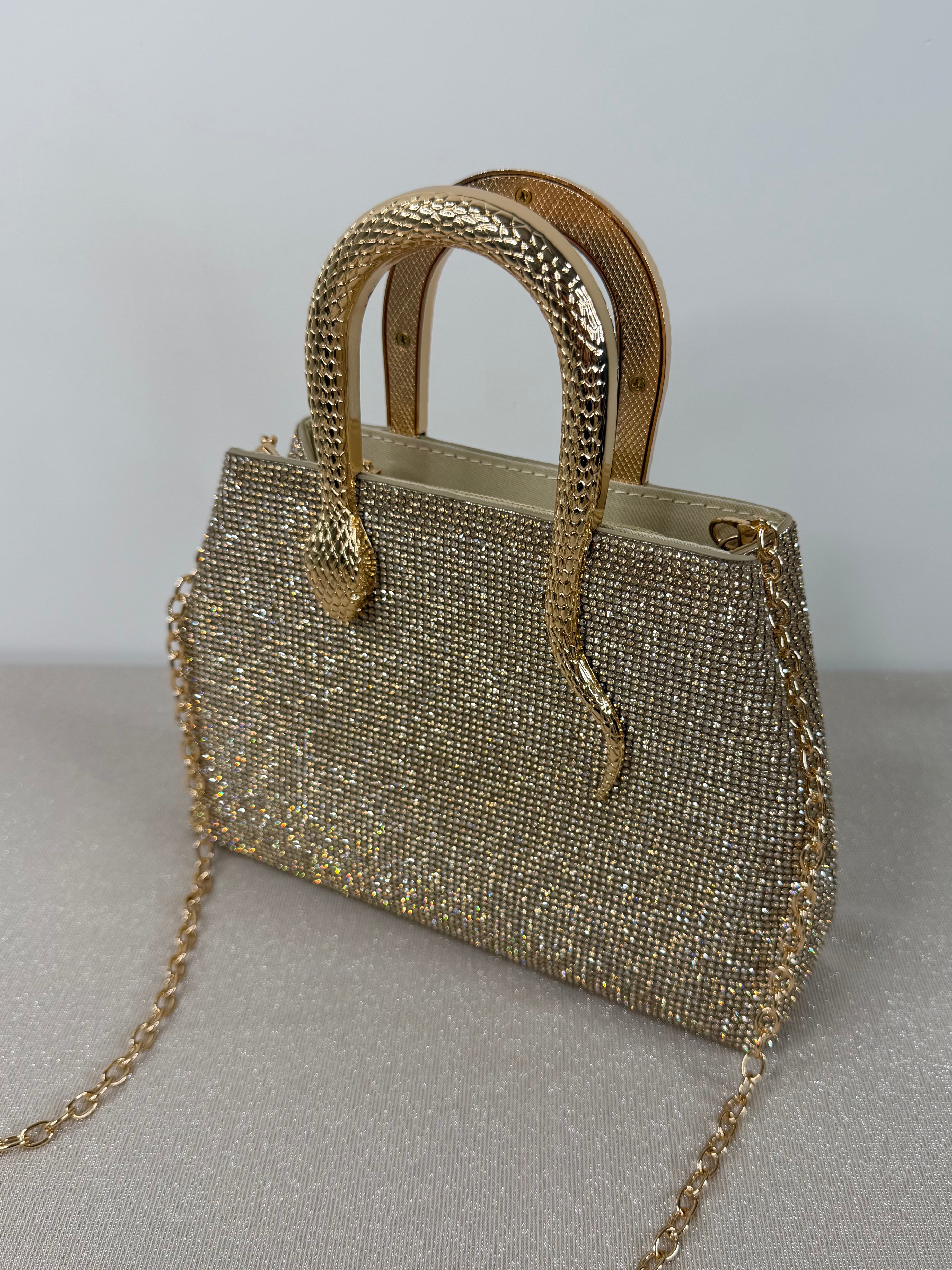 Borsa con manico a serpente