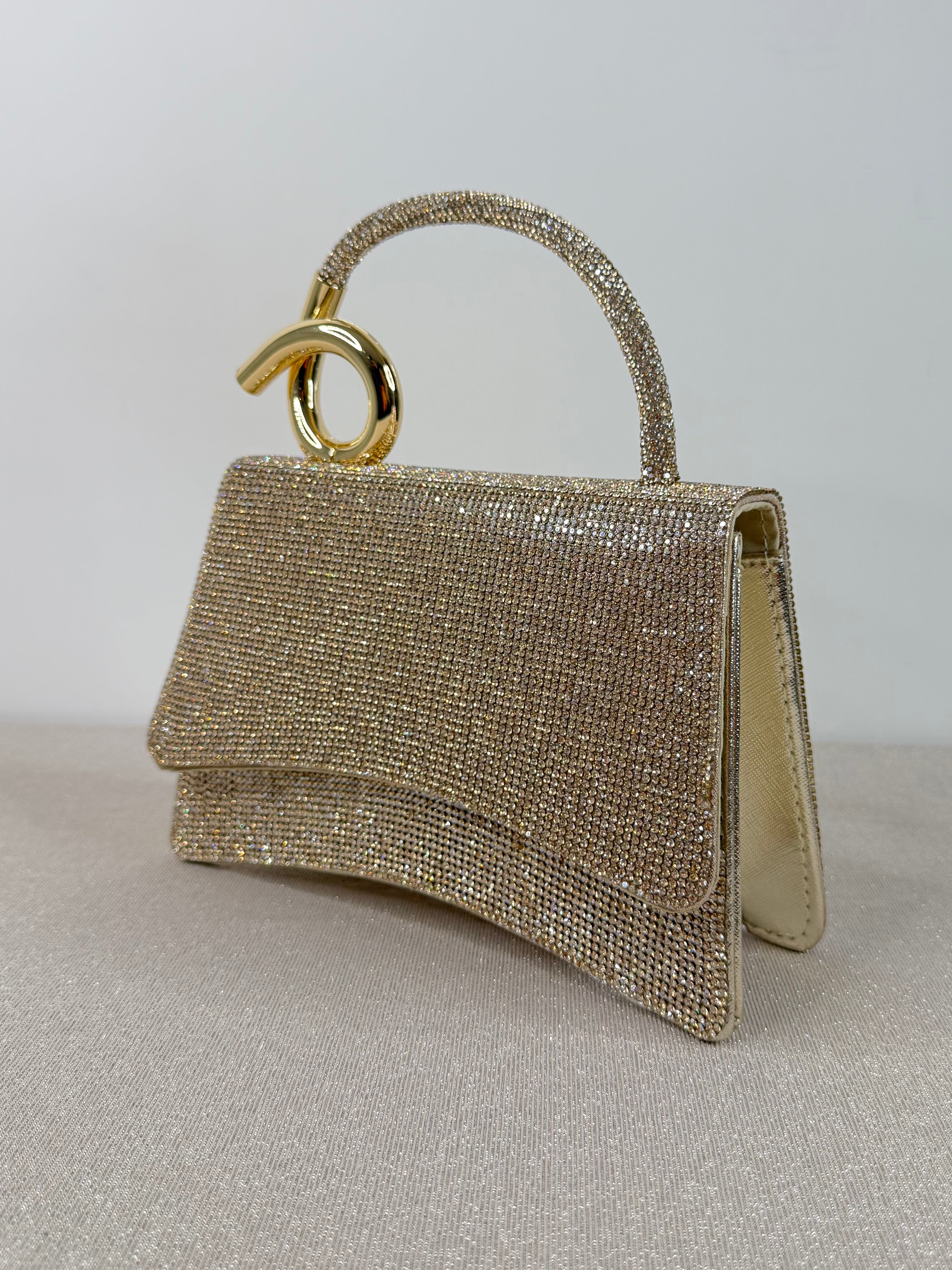 Borsa  elegante con cristalli e manico gioiello