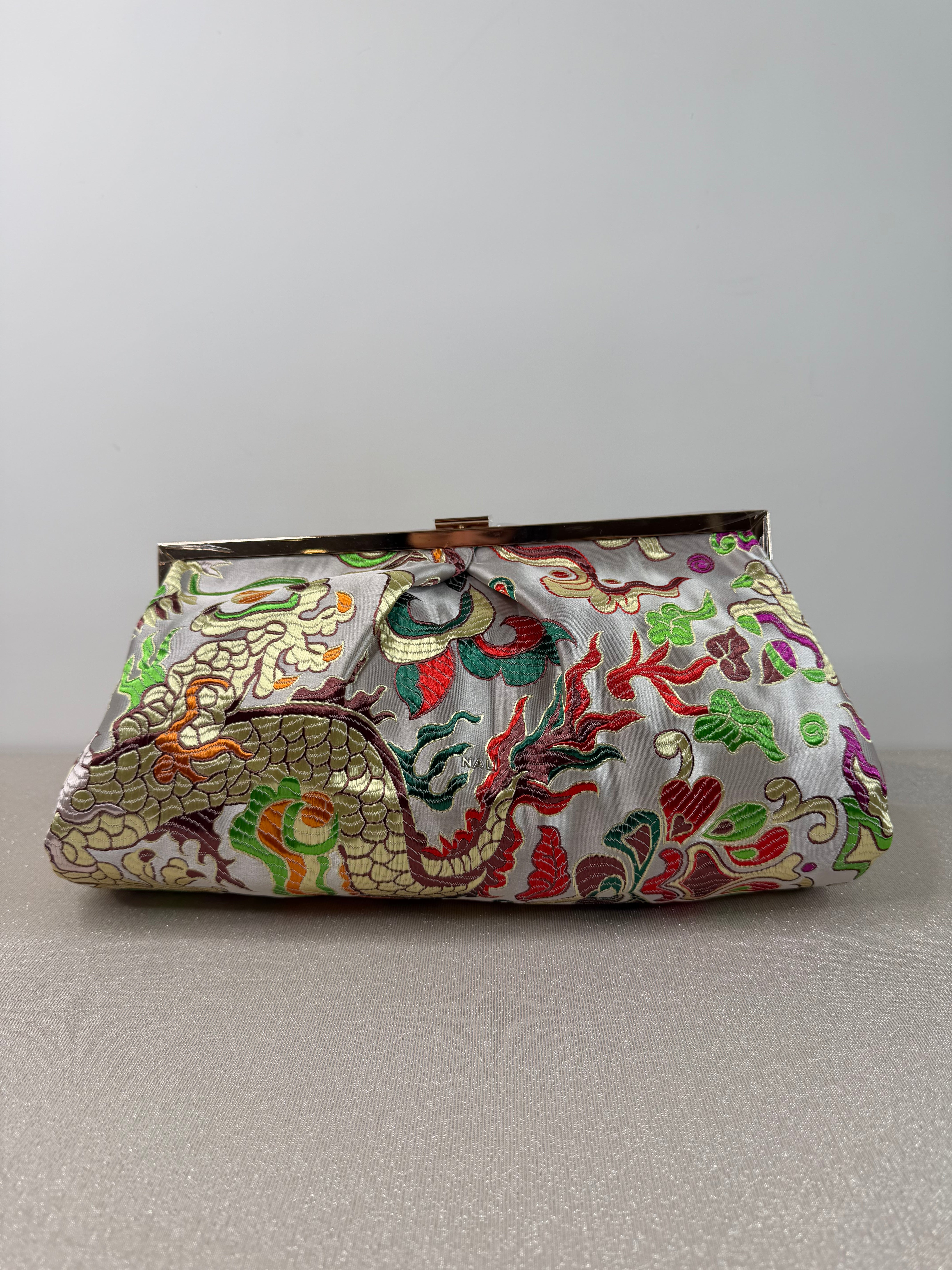Pochette elegante ricamata con tracolla