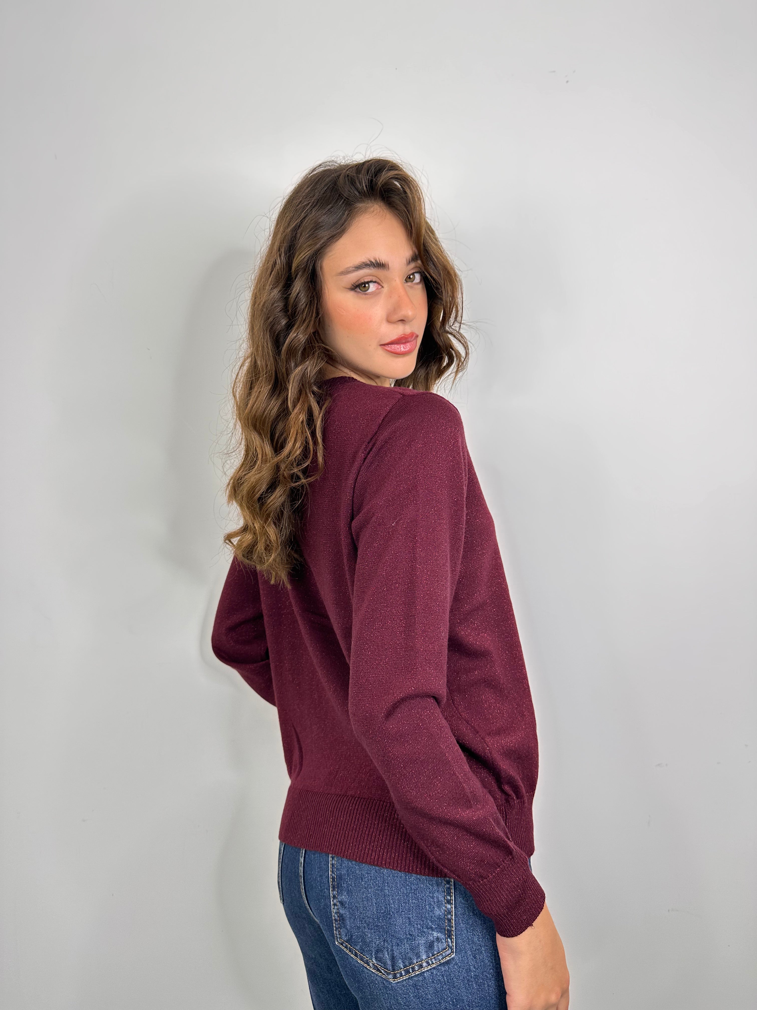 Maglia con rouches e dettaglio gioiello